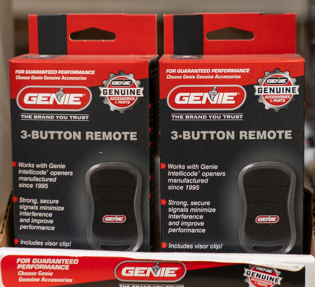 Genie 3-button remote garage door opener with secure performance and included visor clip.